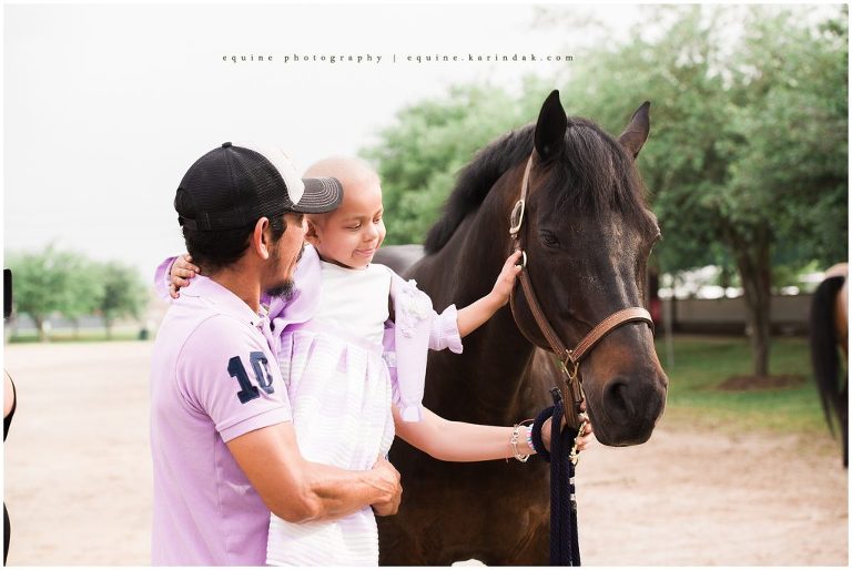 best houston photographer captures sweet moment with father while petting a horse